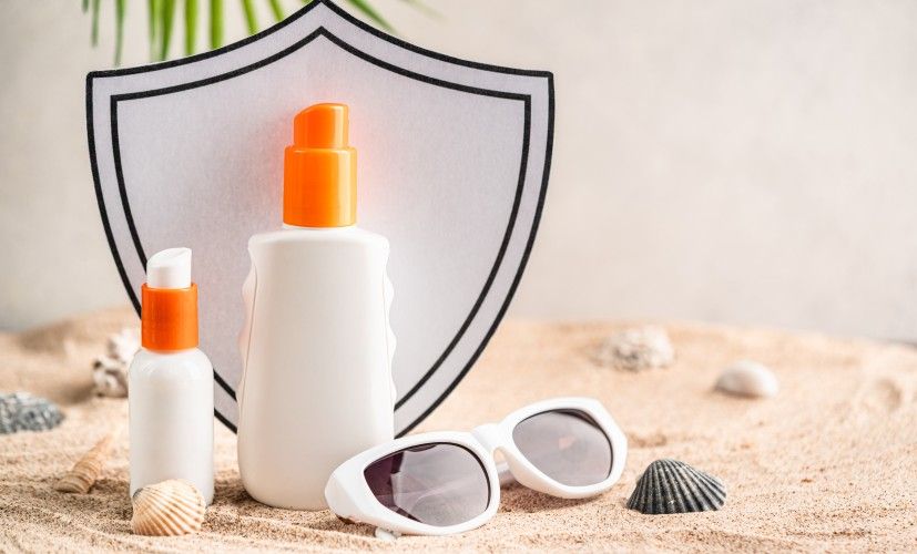 sunscreen-protection-on-sandy-beach-with-sunglasse